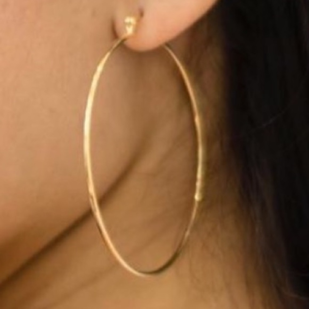 - 10 K Gold filled Large hoops. New with tags.